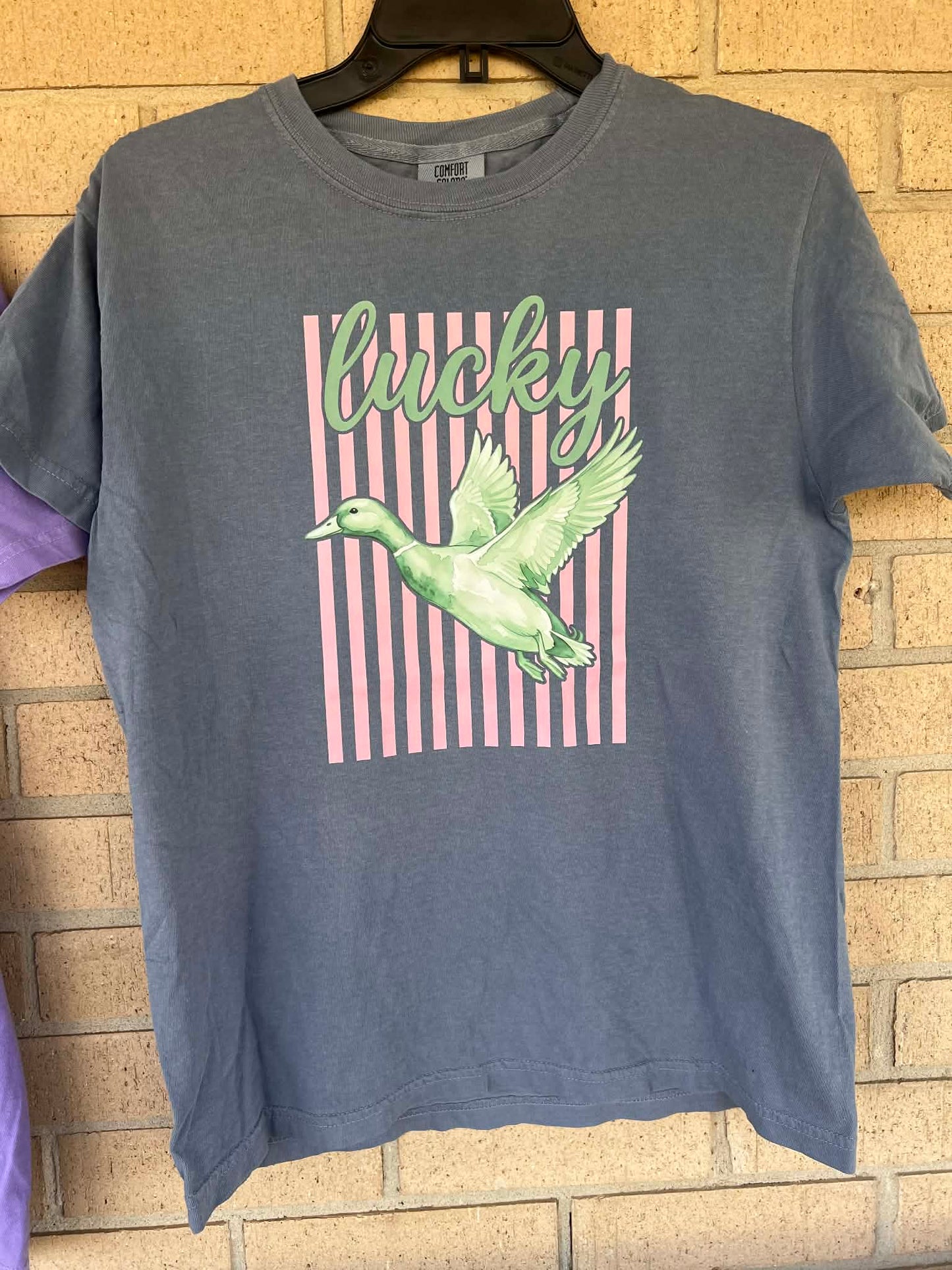 Lucky duck with pink stripped background tee
