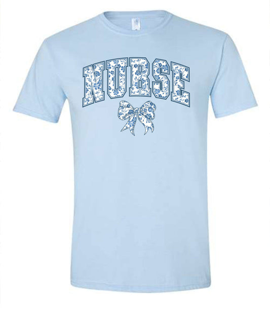 blue floral nurse with bow tee