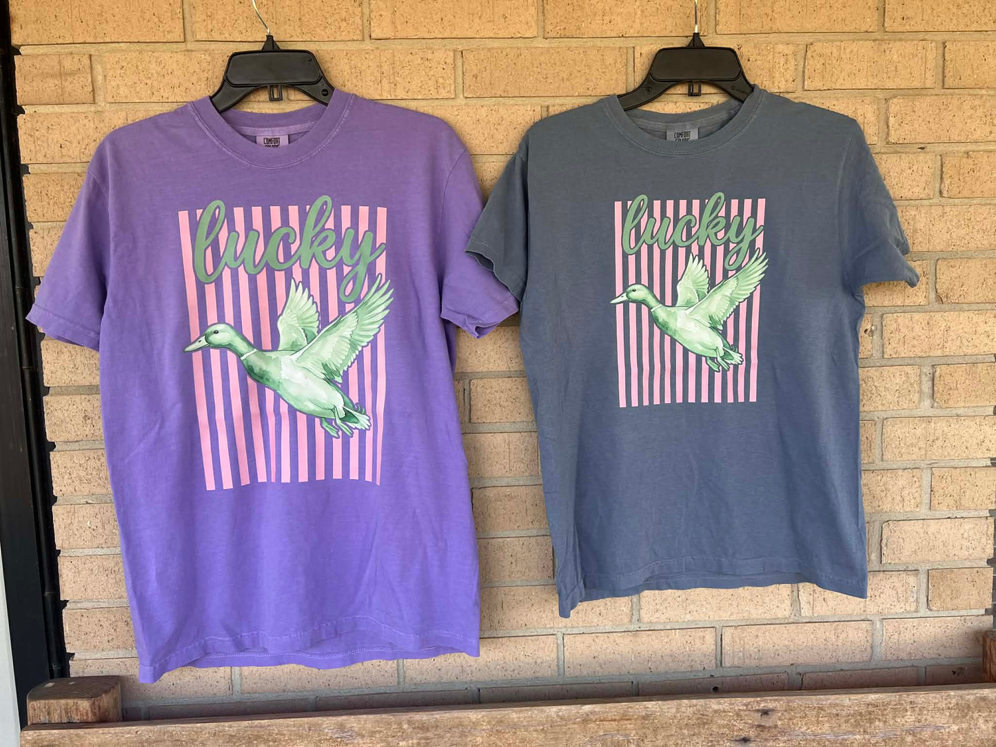 Lucky duck with pink stripped background tee