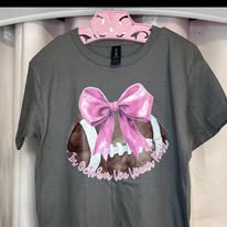 In October we wear pink football with pink bow tee