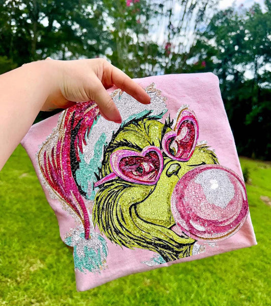 Grinch blowing bubble tee