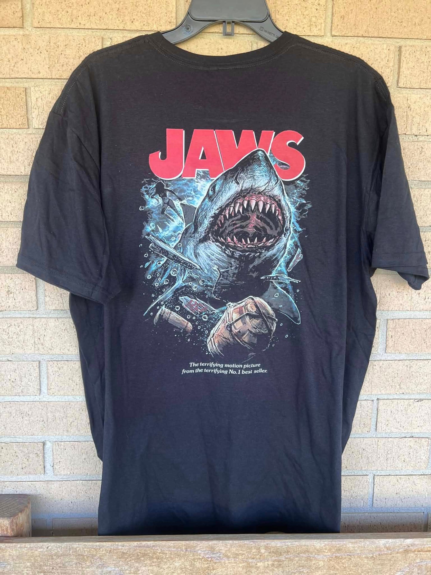 JAWS the terrifying motion picture from the terrifying number 1 best seller tee
