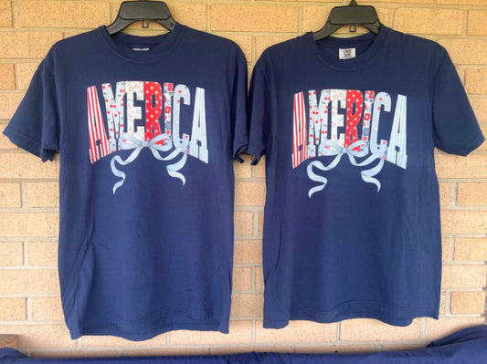 America with dainty bow tee