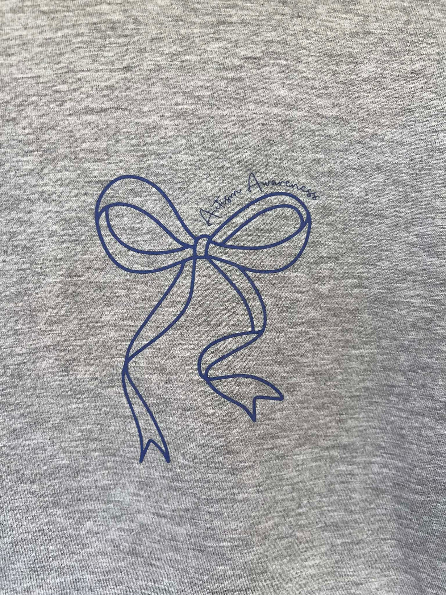 In April we wear blue dainty bow pocket tee
