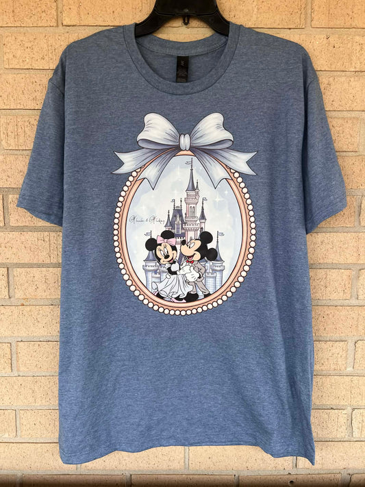 Mickey and Minnie in a mirror with Bow tee